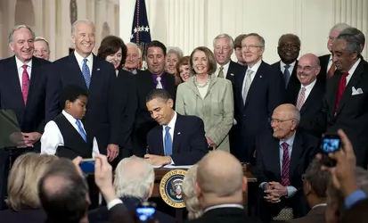 Signature de l’Obamacare - crédits :  The Washington Post/ Getty-Images